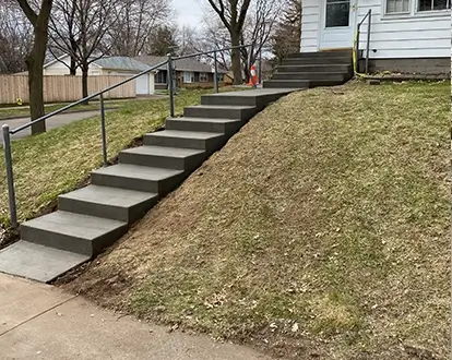 concrete steps leading to home front door