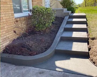 Concrete steps in front of home