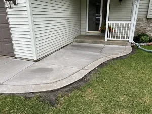Curved concrete sidewalk