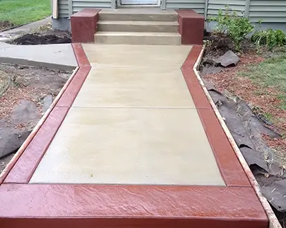 MN Decorative concrete sidewalk with red trim